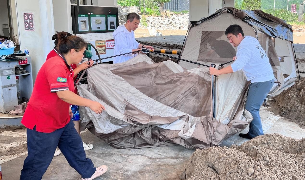 风雨同舟·“易”往情深｜“易积分”赴中石化受灾油站慰问一线加油员